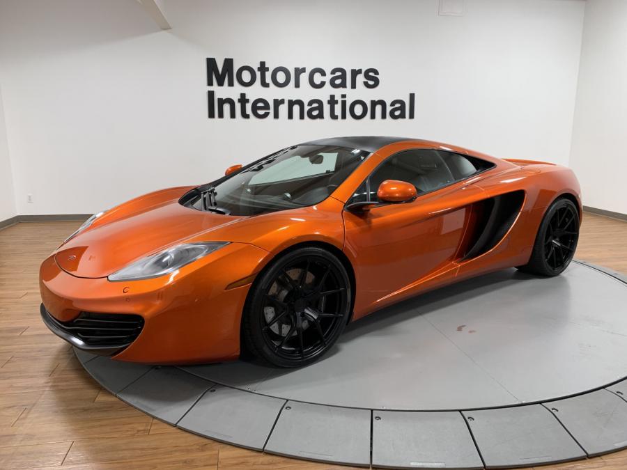  McLaren MP4-12C 2012 года  (фото 1 из 48)